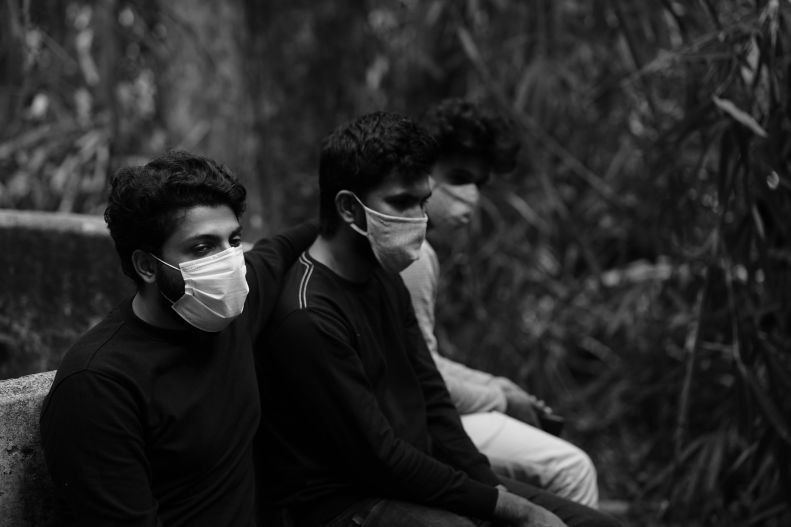 Young men in masks near Kerala, India