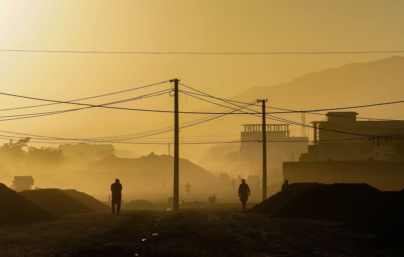 dusty checkpoint in Kabul, yellow haze