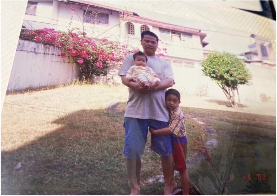 An old print picture of Michelle as a child and her family.