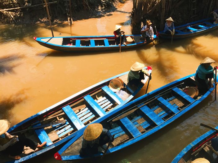 Blue boats on the Mekong River Delta, Vietnam