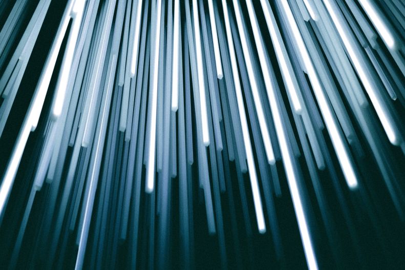 white and black digital wallpaper (streaming lights, looks high tech)