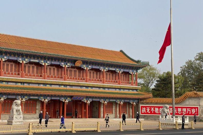 The Chinese flag at a gate to the Zhongnanhai leadership compound flies at half-mast in memory of late former Chinese premier Li Keqiang, in Beijing, China November 2. (Mark Chisholm-Reuters)