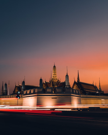 Time lapse of car traffic passing a temple.
