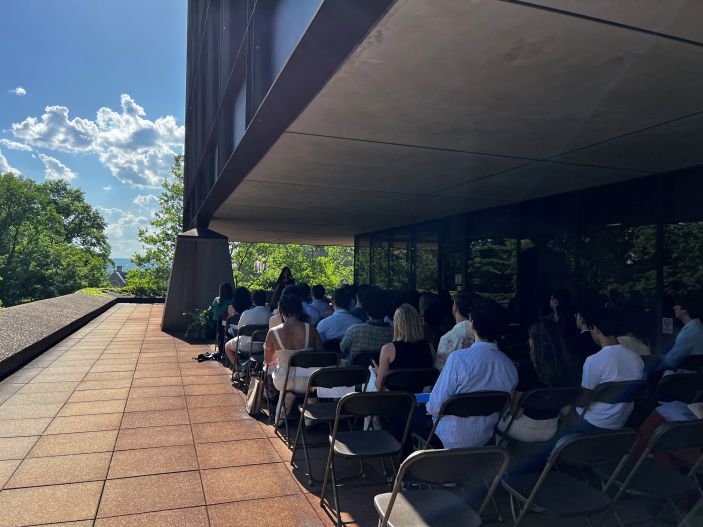Students sitting in chairs facing speaker