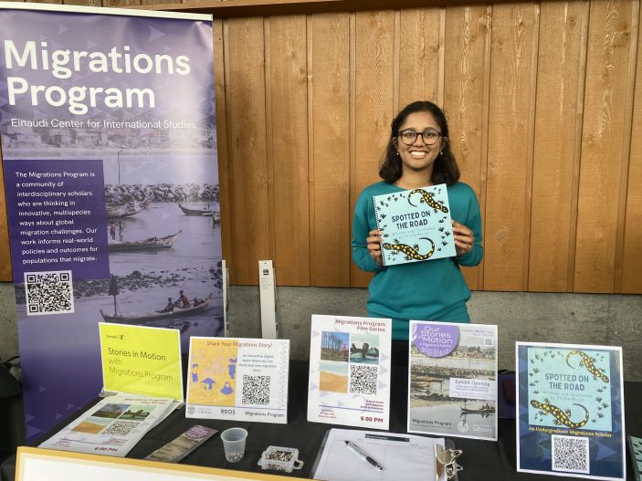 Trisha Bhujle holds her book, "Spotted on the Road."