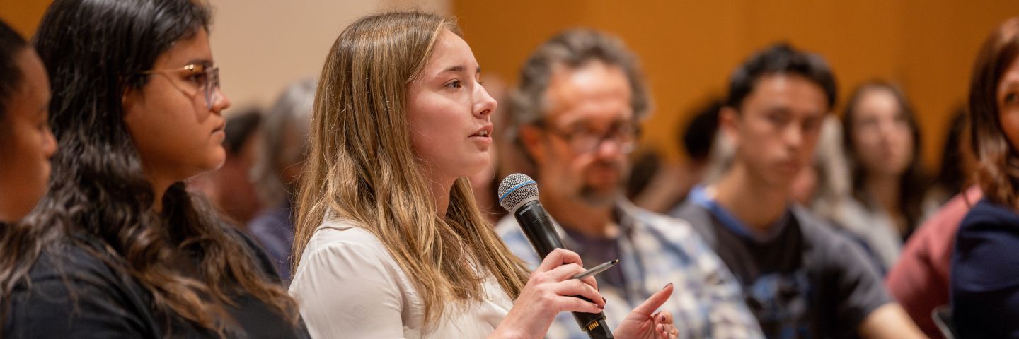 Undergraduate Global Scholar Natalie Dreyer ’27 asks question at Bartels lecture, Oct. 23, 2024