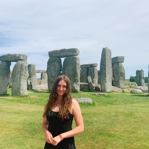 Melanie Marshall stands in front of Stonehenge