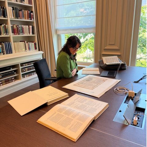 Rachel Cilia-Werdmölder studies materials in the University of Amsterdam special collections reading room.