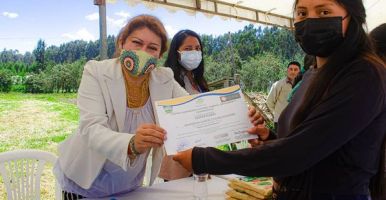 Woman receiving a certificate